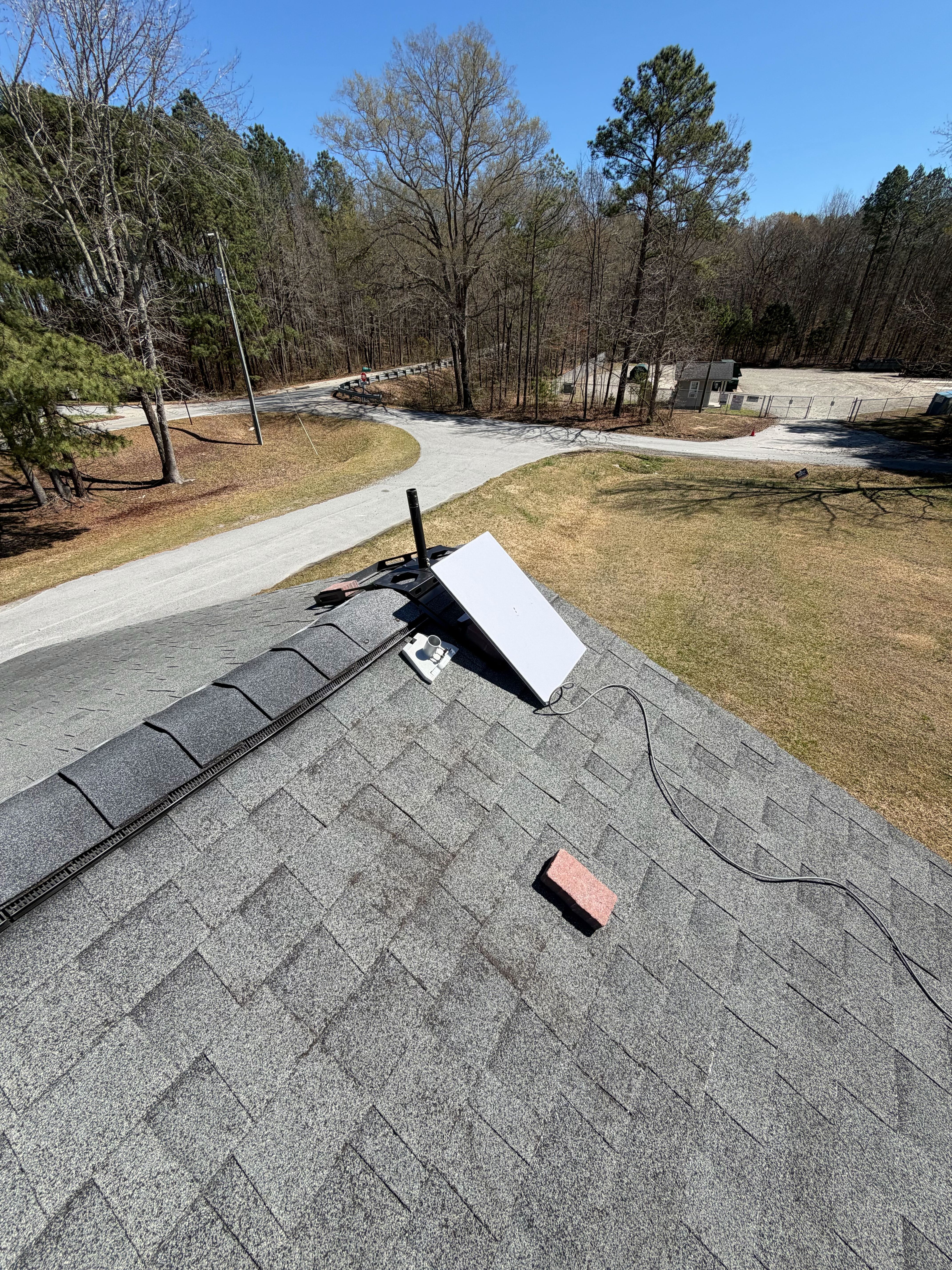 Starlink unit installed on a roof at a rural Virginia deployment site